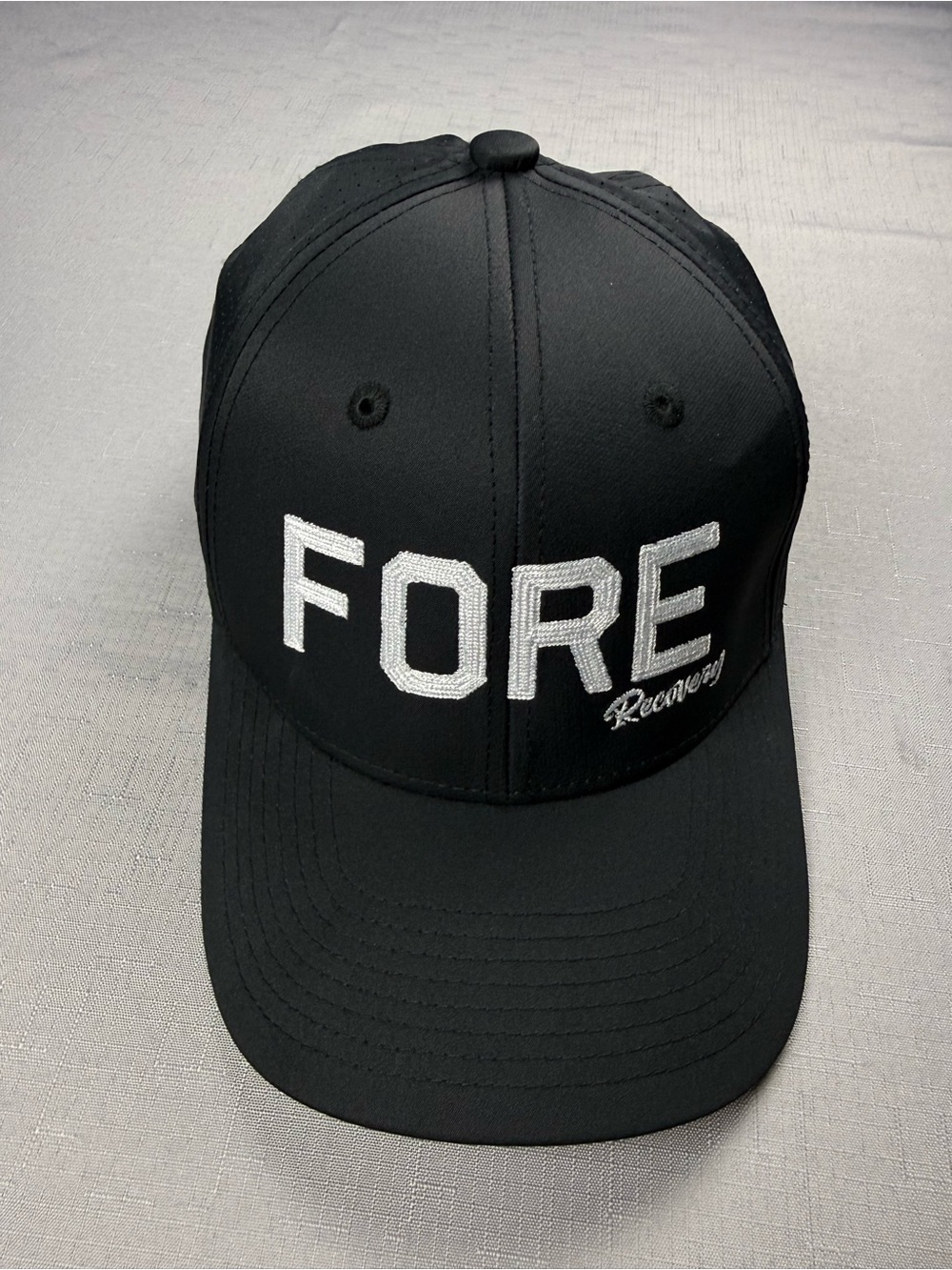 Sport-Tek Black Hat with White "FORE" Embroidery - Picture 1 of 6